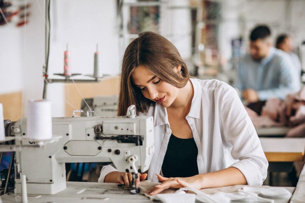 A hard working woman starting clothes.